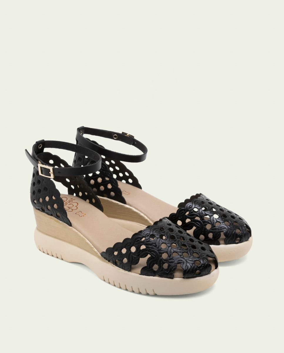 SANDALES À TALONS COMPENSÉS EN CUIR TRESSÉ EVA NOIR