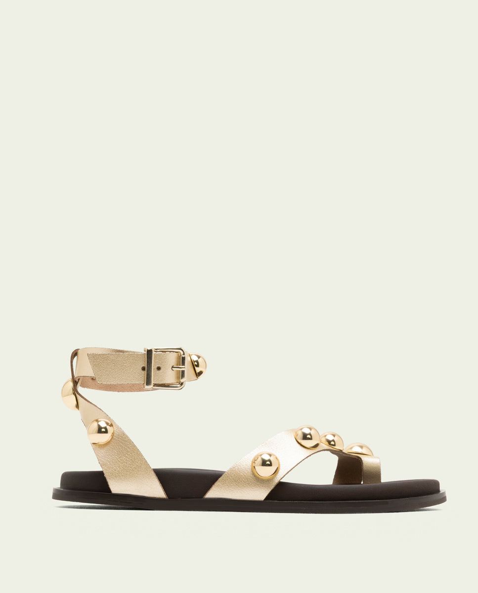 SANDALE PLATE EN CUIR CLOUS HOLLY OR