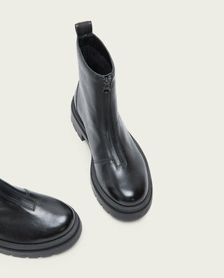 BOTTINES TRACK NOIRS EN CUIR AVEC FERMETURE ÉCLAIR NALA.