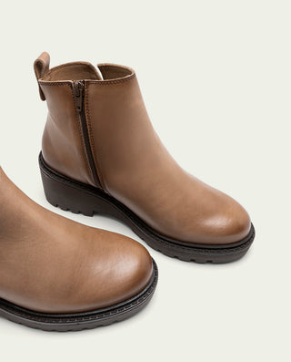 BOTTINES EN CUIR À SEMELLE COMPENSÉE TAUPE ELENA