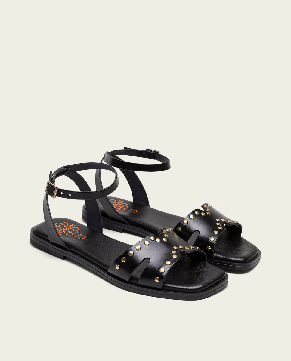 SANDALE PLATE EN CUIR NOIR CLOUTÉ VIKA